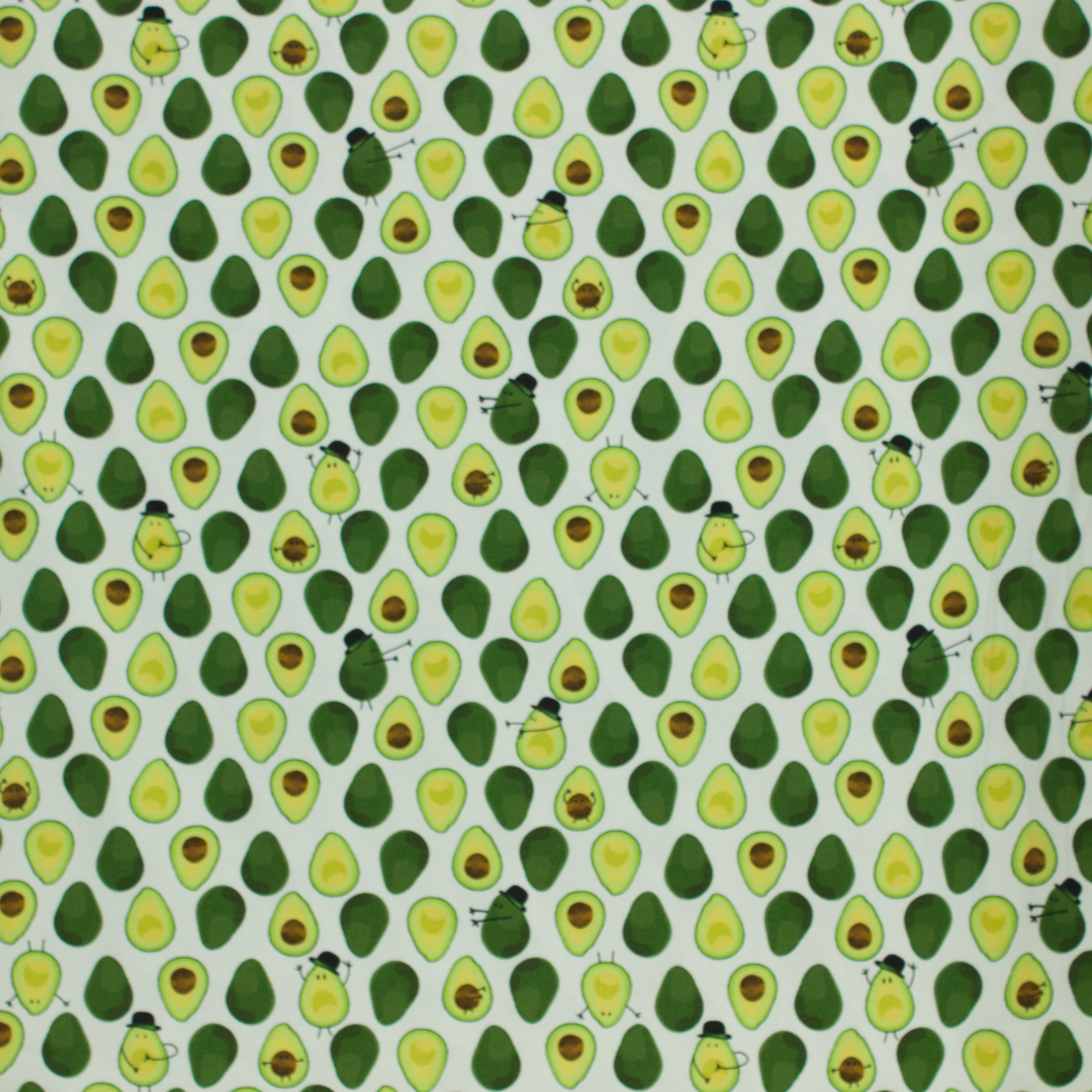 Witte tricot met avocado's en avocadomannetjes